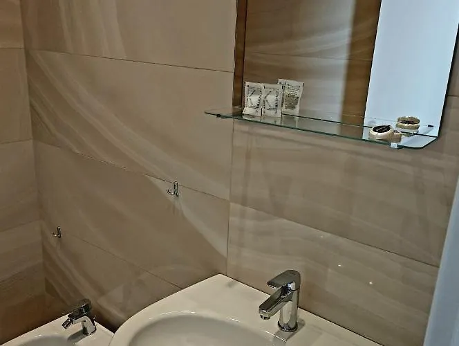 Maison Olimpo בית הארחה